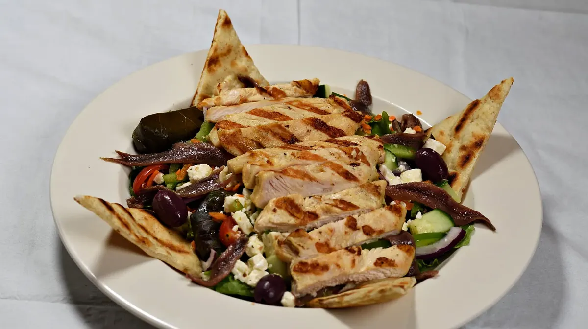 Grilled chicken Greek salad with pita