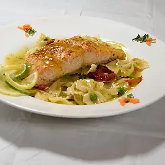 Salmon over bowtie pasta