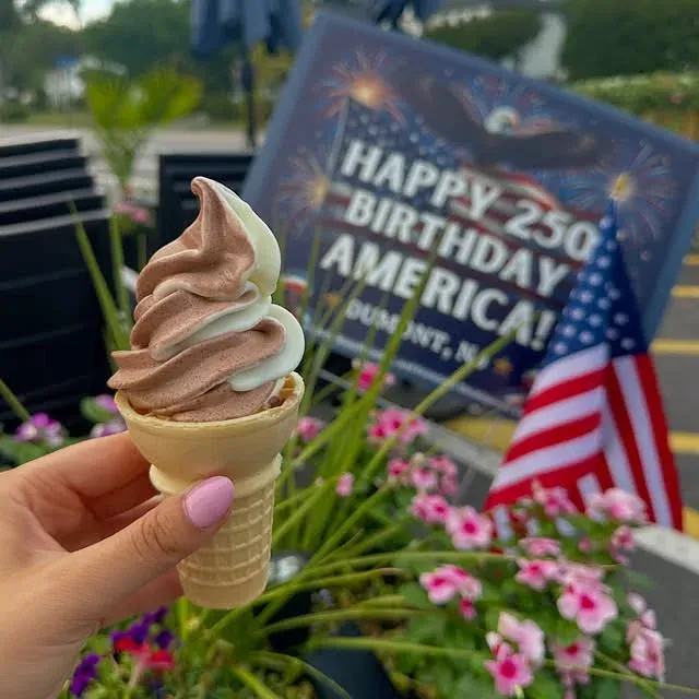 A chocolate and vanilla soft serve twist cone