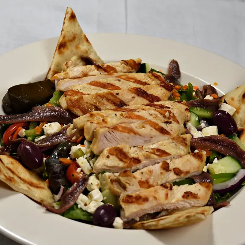 Grilled chicken Greek salad with pita