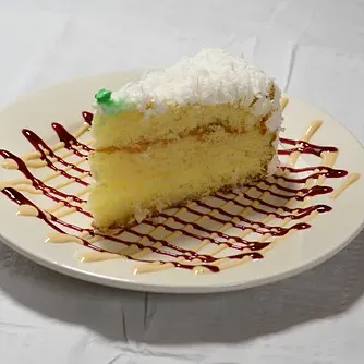 A slice of coconut cake