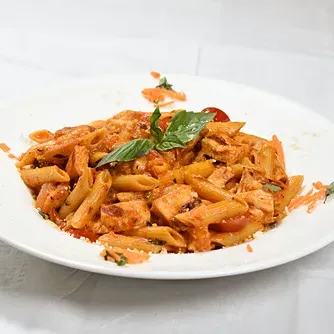 Penne in a tomato sauce with basil